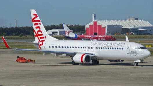 a white airplane on the runway