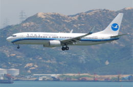 a plane flying over water