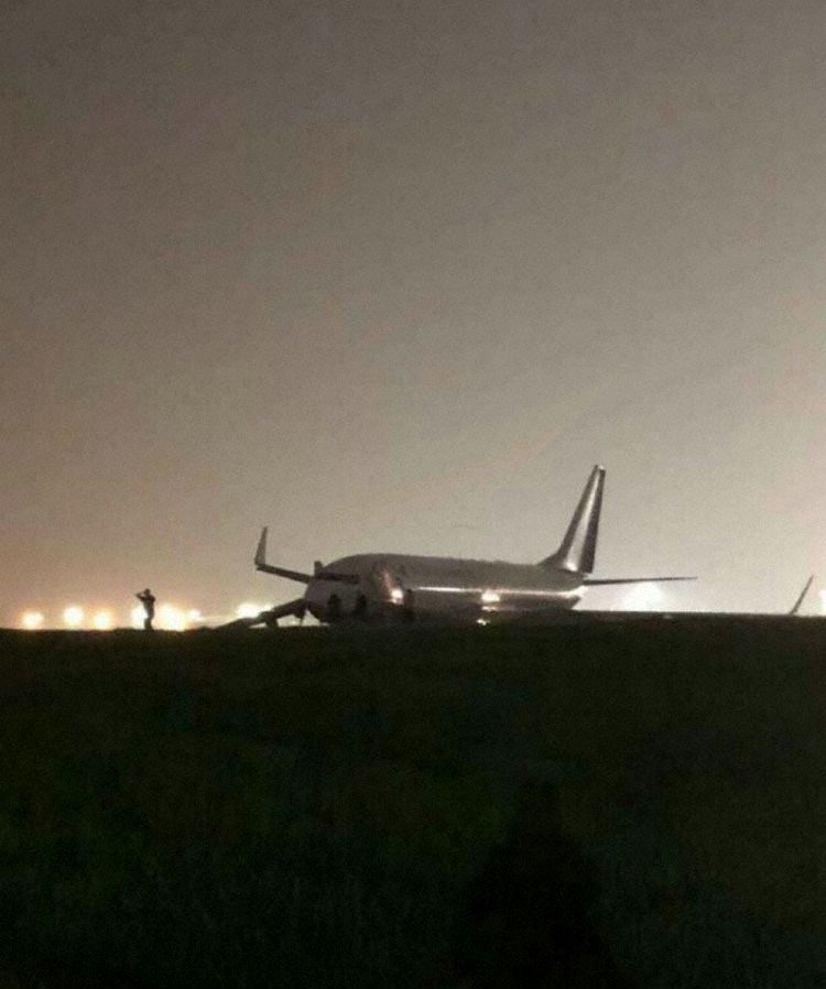 an airplane on the ground at night