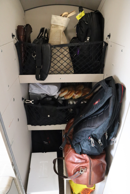 a closet full of bags and purses