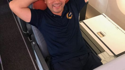 a man sitting in an airplane