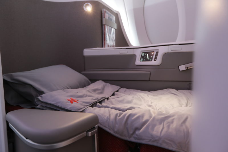 a bed in a plane