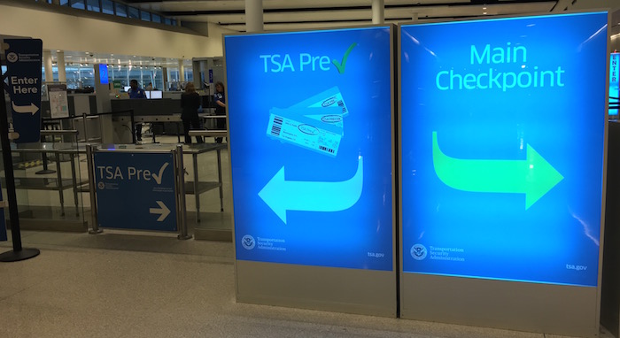 signs in a terminal at an airport