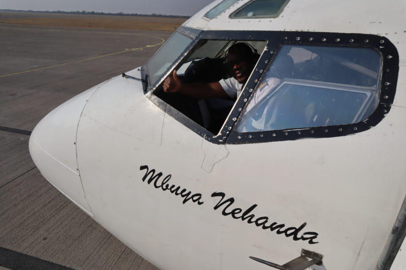 a man in the cockpit of an airplane