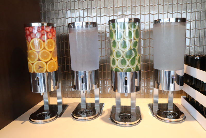 a group of fruit dispensers