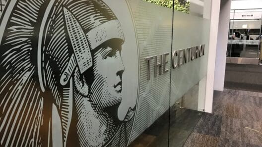 a sign on a glass wall