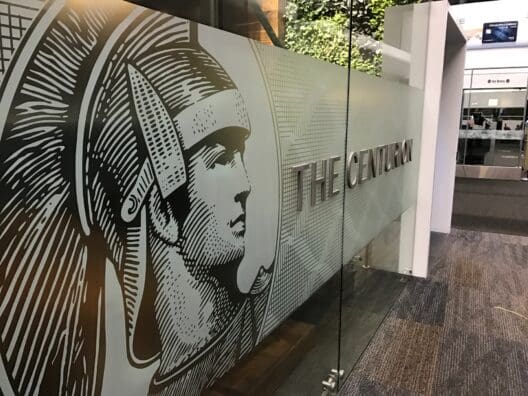 a sign on a glass wall