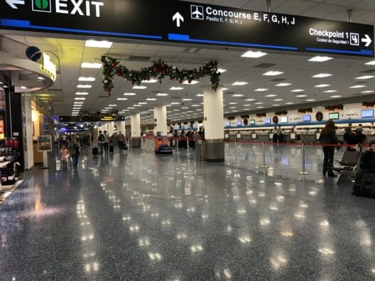 a group of people in an airport