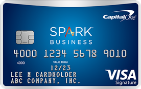 a blue credit card with silver text