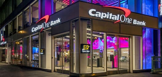 a building with glass doors and a sign