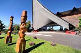 a statue in front of a building