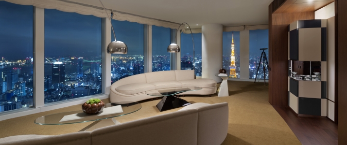 a living room with a view of the city