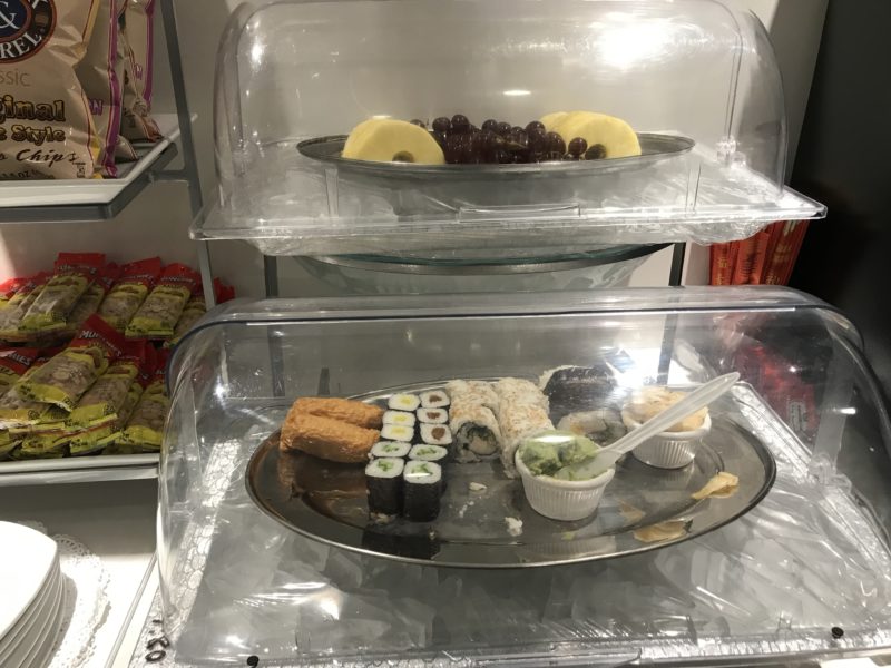 food on a tray in a display case