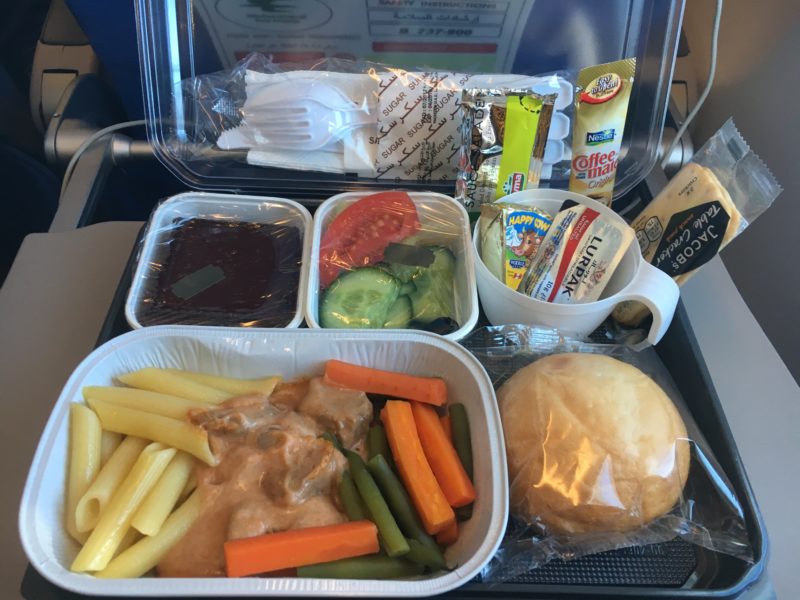 food in a tray on a plane