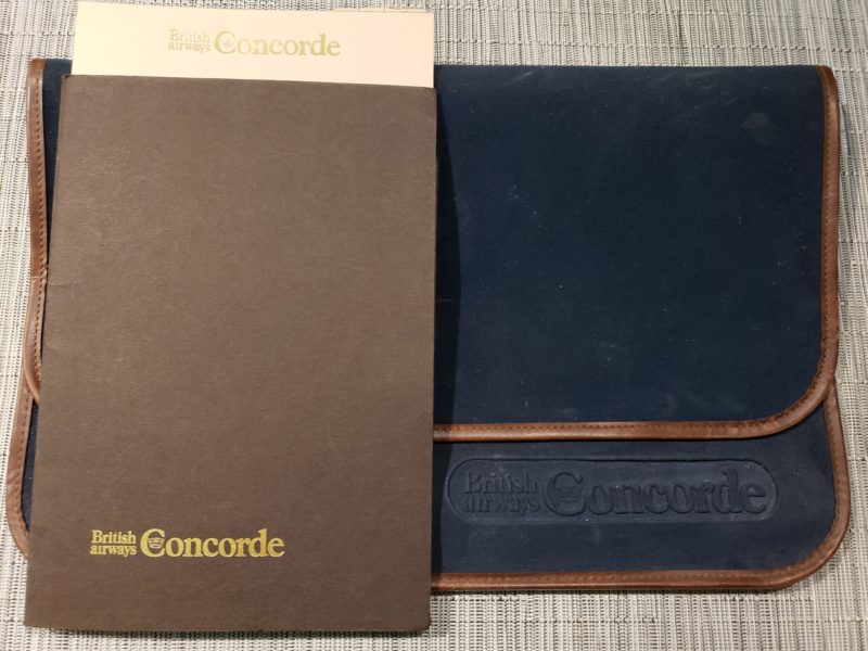 a brown and blue folders with text on them