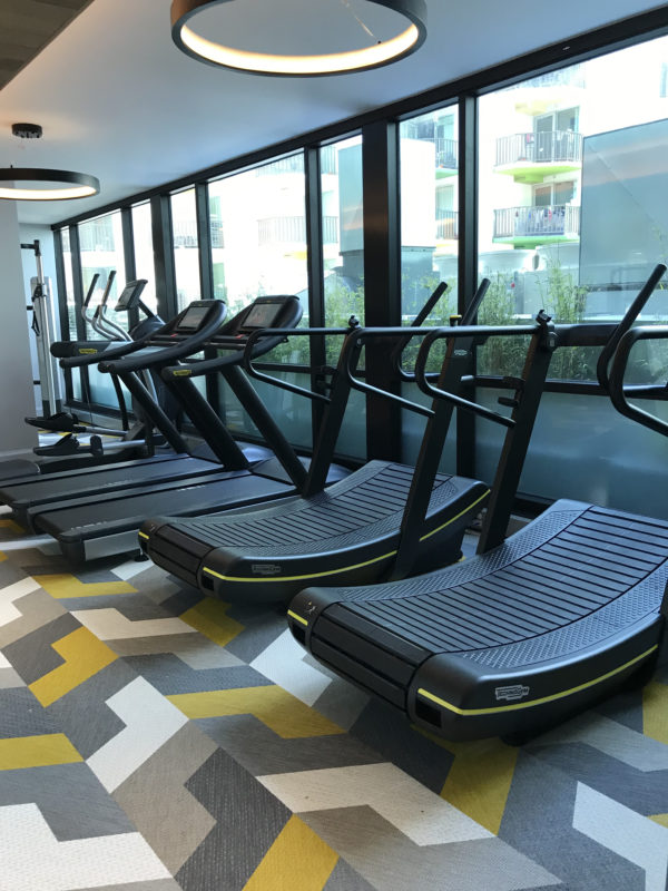 a group of treadmills in a room