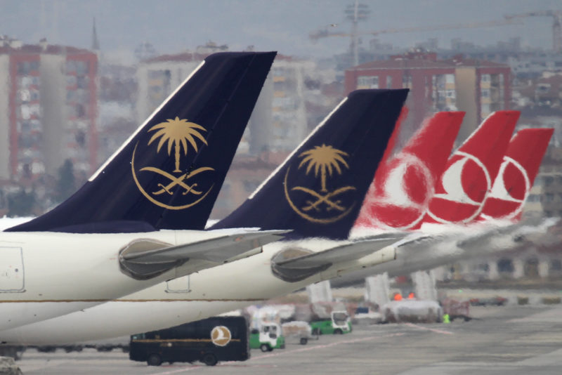 a group of airplanes in a row