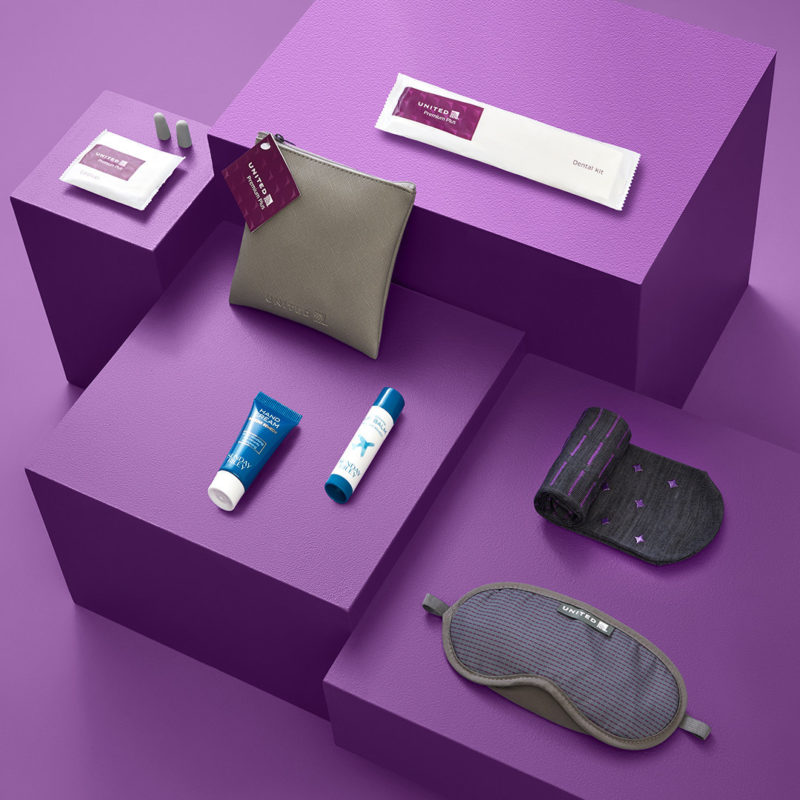 a purple cubes with objects on it