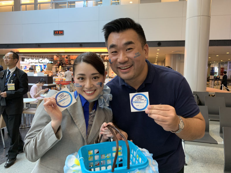 a man and woman holding shopping bags