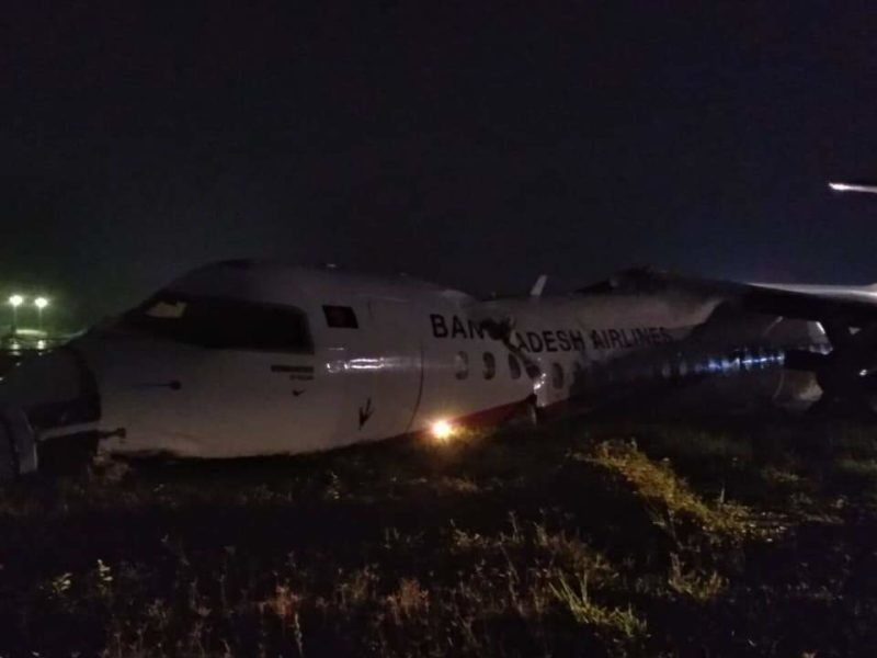 a plane crashed in the grass at night