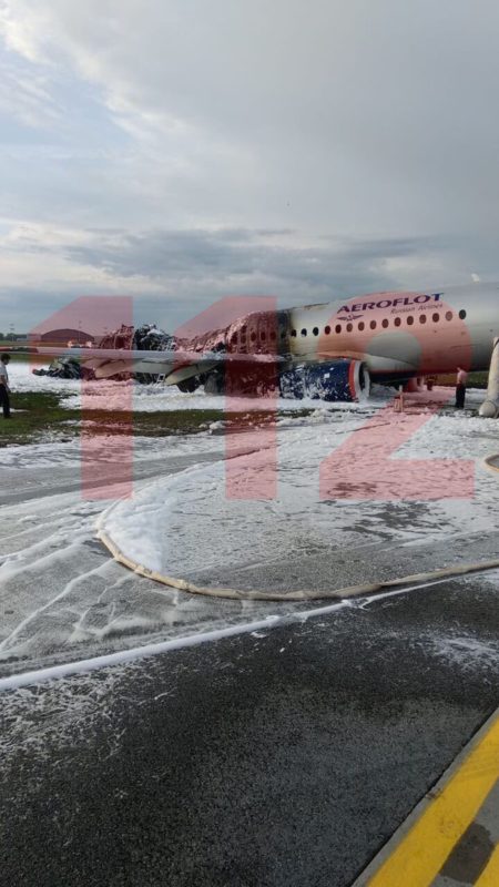 a plane on the ground with foam on the ground