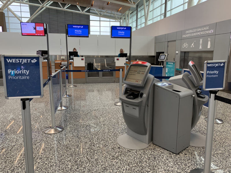 a check in area with a few screens
