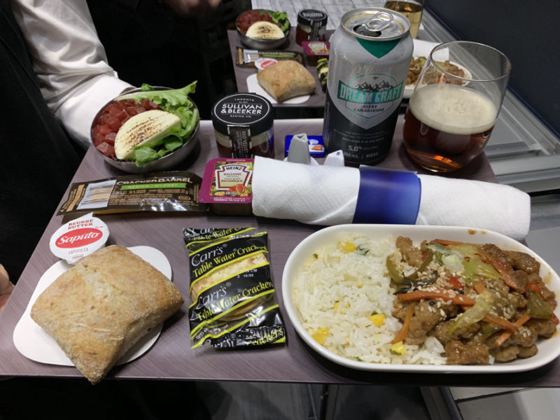 a tray of food and drinks on a table