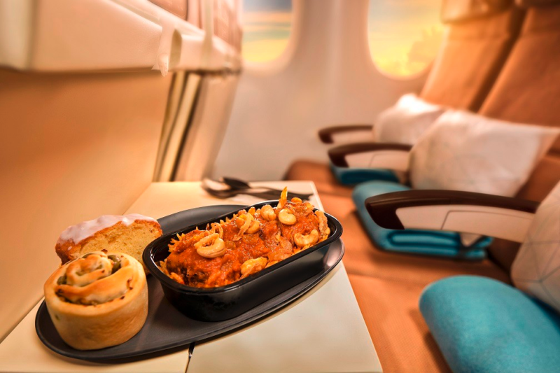 food on a tray in an airplane