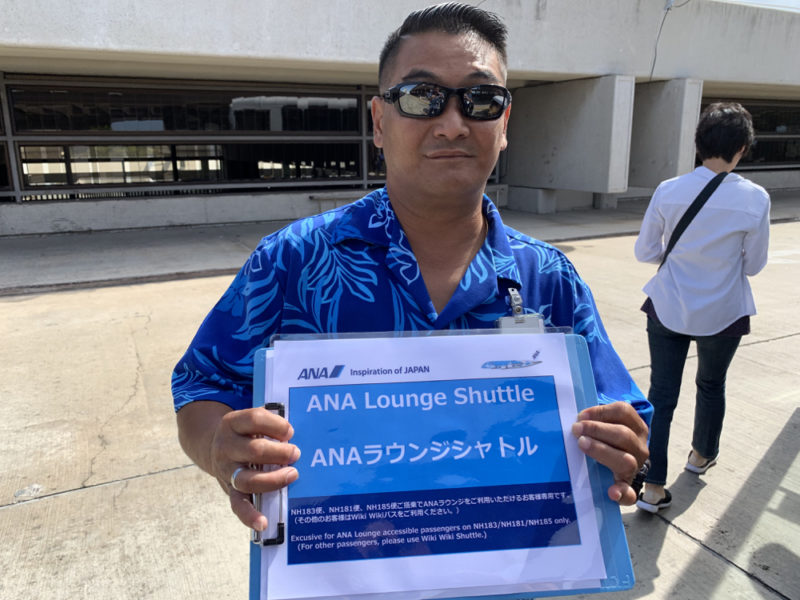 a man holding a sign