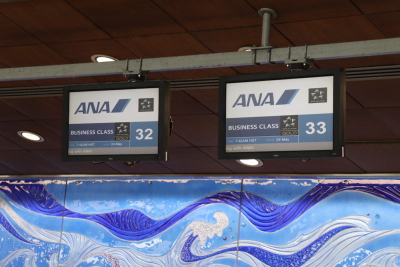 a sign board with a blue and white background