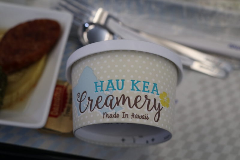 a container of creamery on a tray