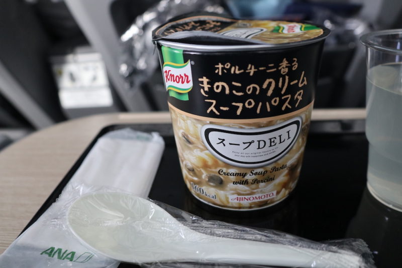 a container of soup with text on it