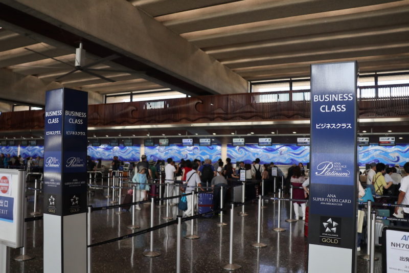 a group of people in an airport