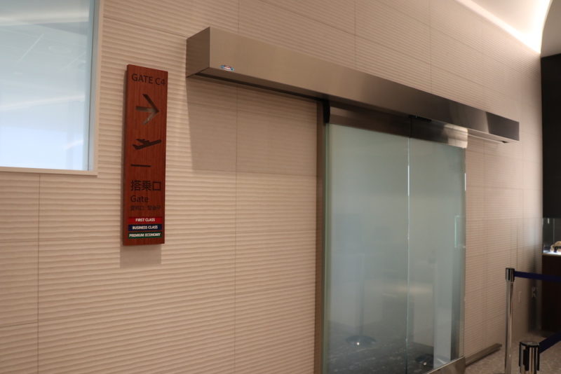 a sliding door with a sign on the wall