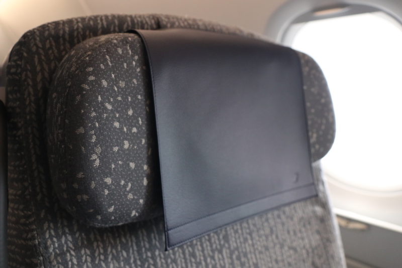 a black leather pad on a head rest