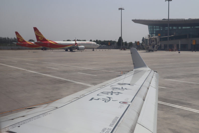 an airplane wing on a runway