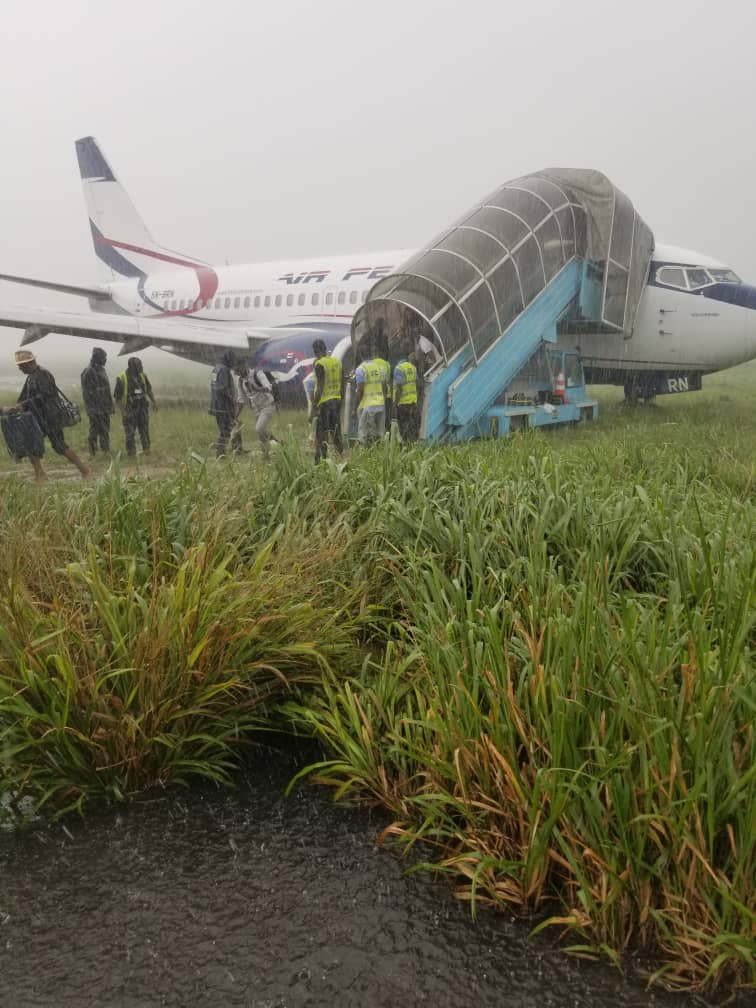 people boarding an airplane