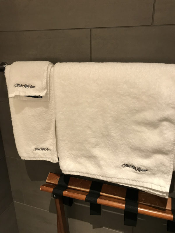 a white towels on a rack