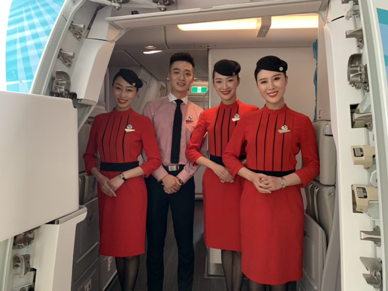 a group of people in red uniforms