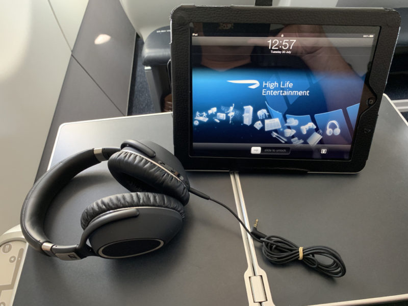 a tablet and headphones on a table