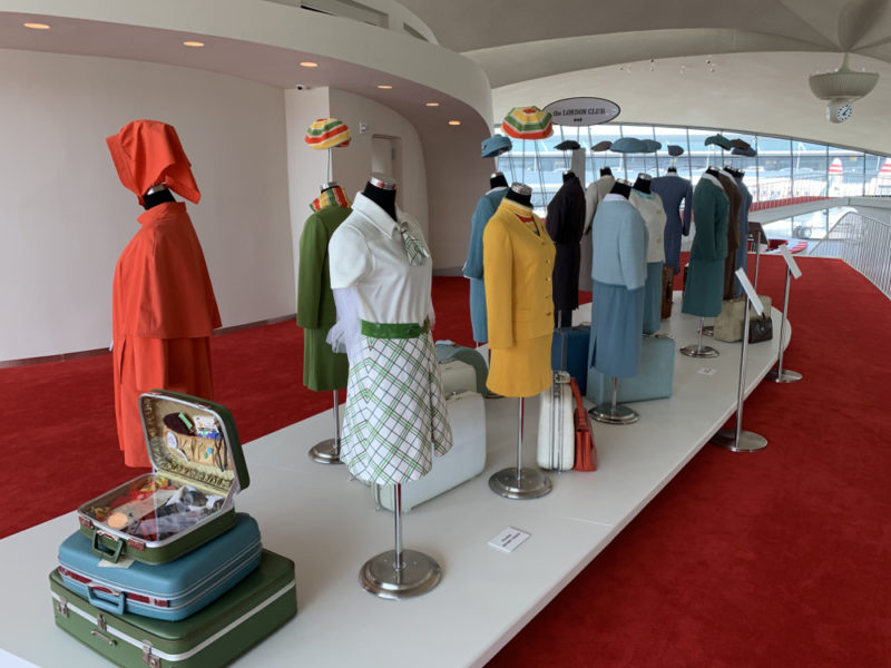 a display of clothes and luggage