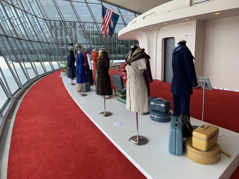 a display of mannequins with luggage