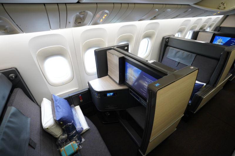 a tv and chair in an airplane