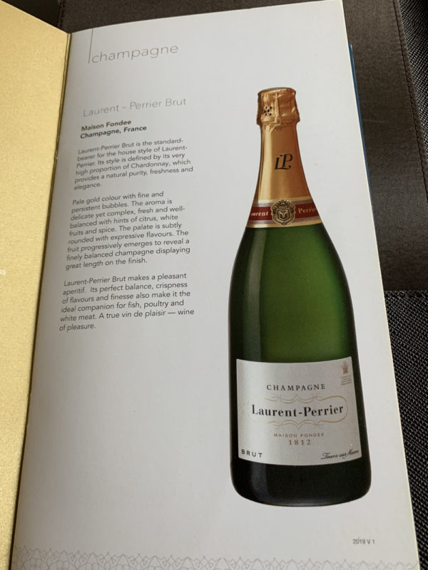 a book with a picture of a bottle of champagne