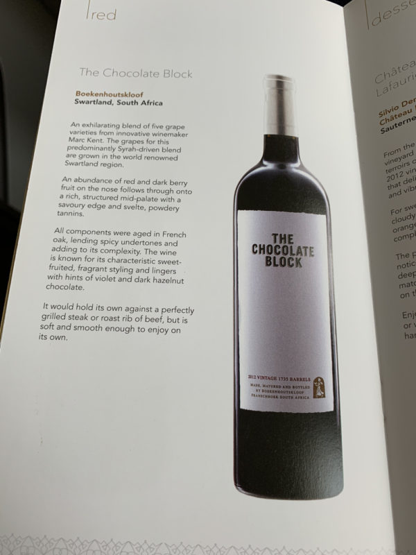 a book with a picture of a bottle of wine