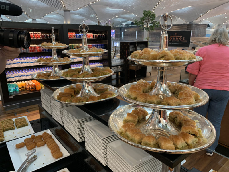 a group of trays of food on a table