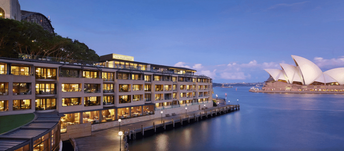 a building next to a body of water