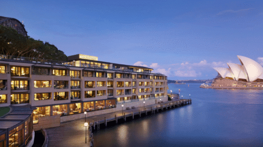 a building next to a body of water