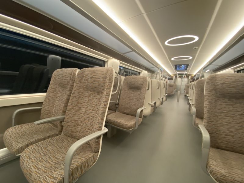 a train with seats and a window