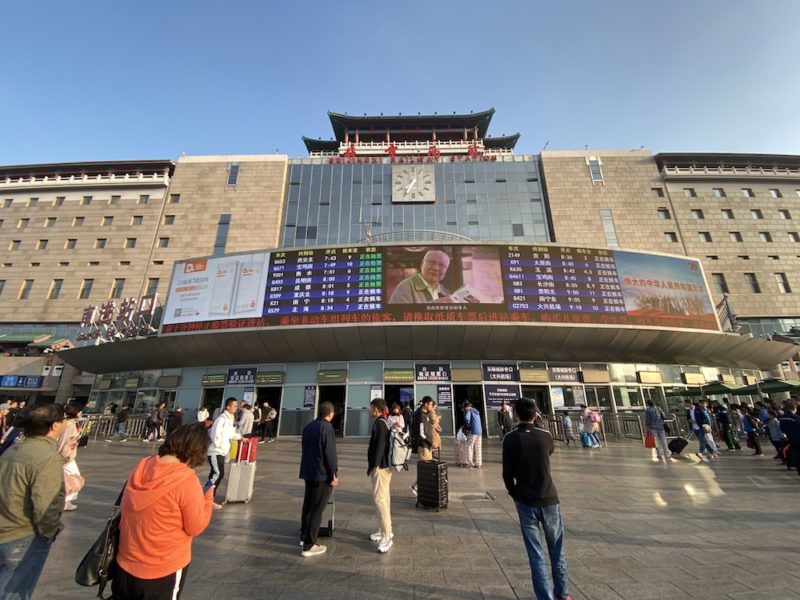 a large building with a large screen on it